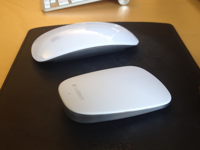 The T631 next to Apple's Magic mouse.