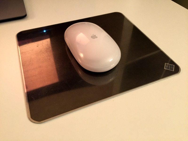 Apple wireless mouse on Sun microsystems metal mouse mat