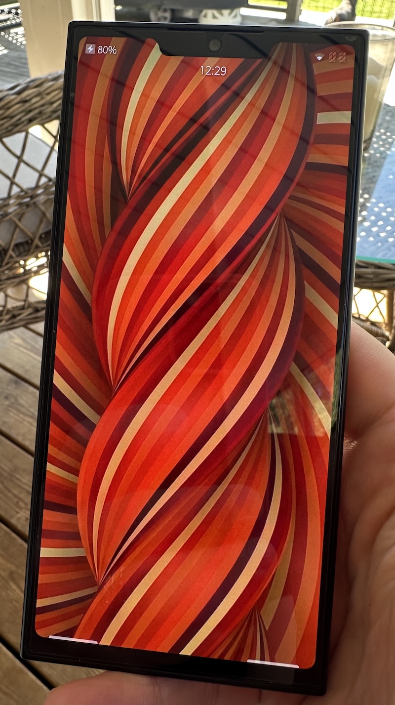 Jolla phone showing orange home screen